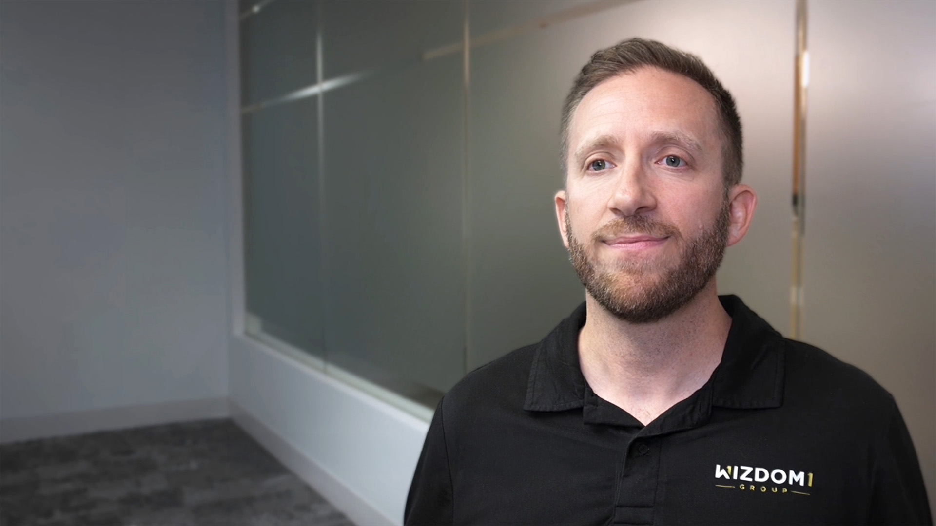 Anthony Vlachos, Co-founder of WizdomOne Group, customer testimonial video thumbnail